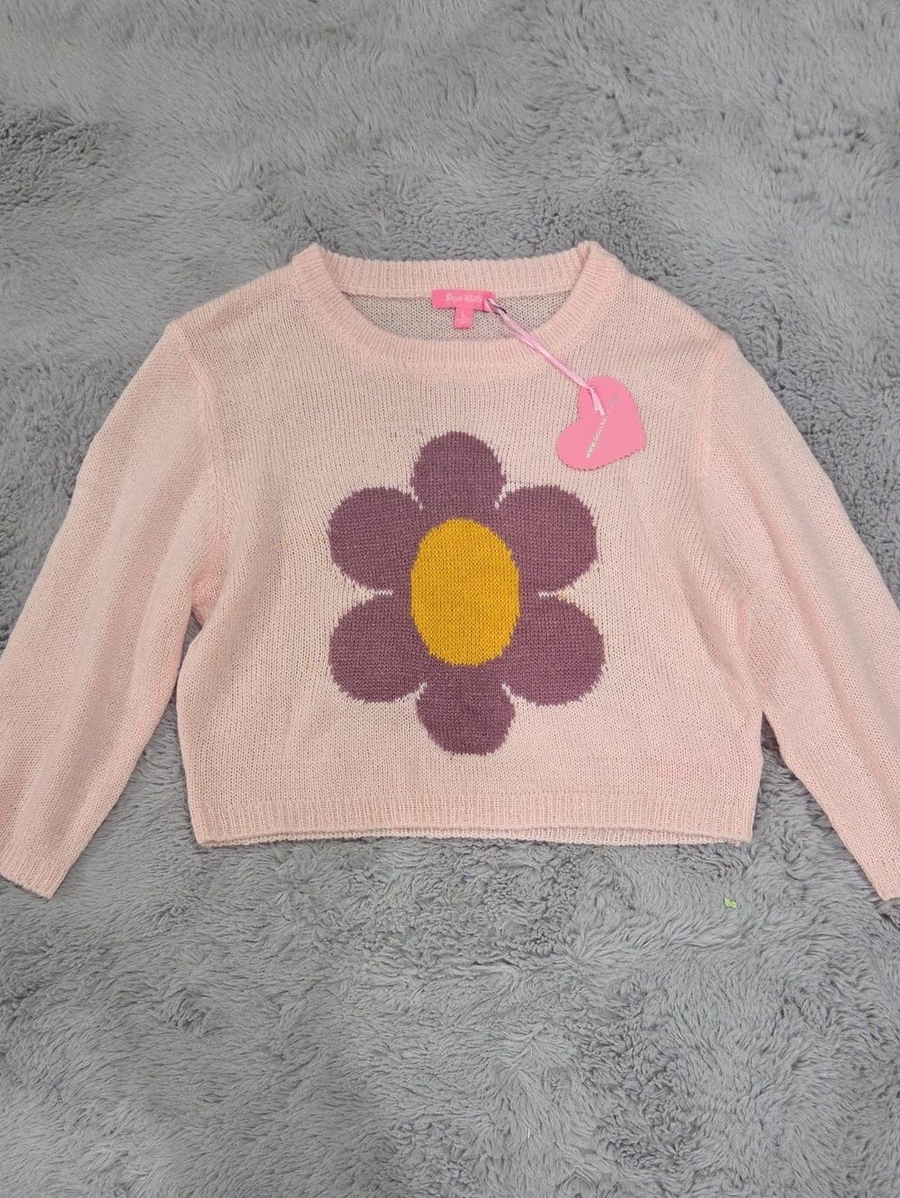 Dolls Kill Sugar Thrillz Pink Floral Cropped Sweater with Yellow Center